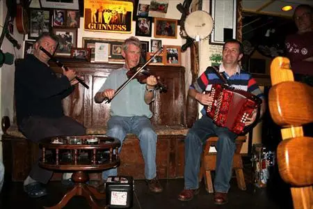 Traditional music session by the fireplace